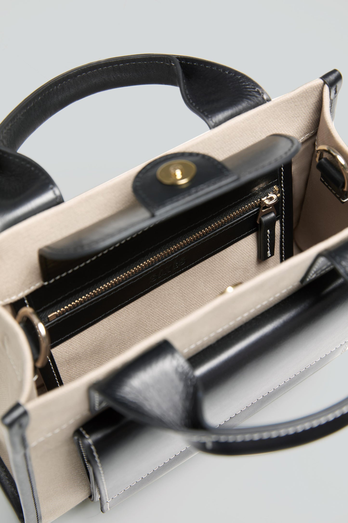 STITCHED POCKET MINI TOTE IN BEIGE/BLACK