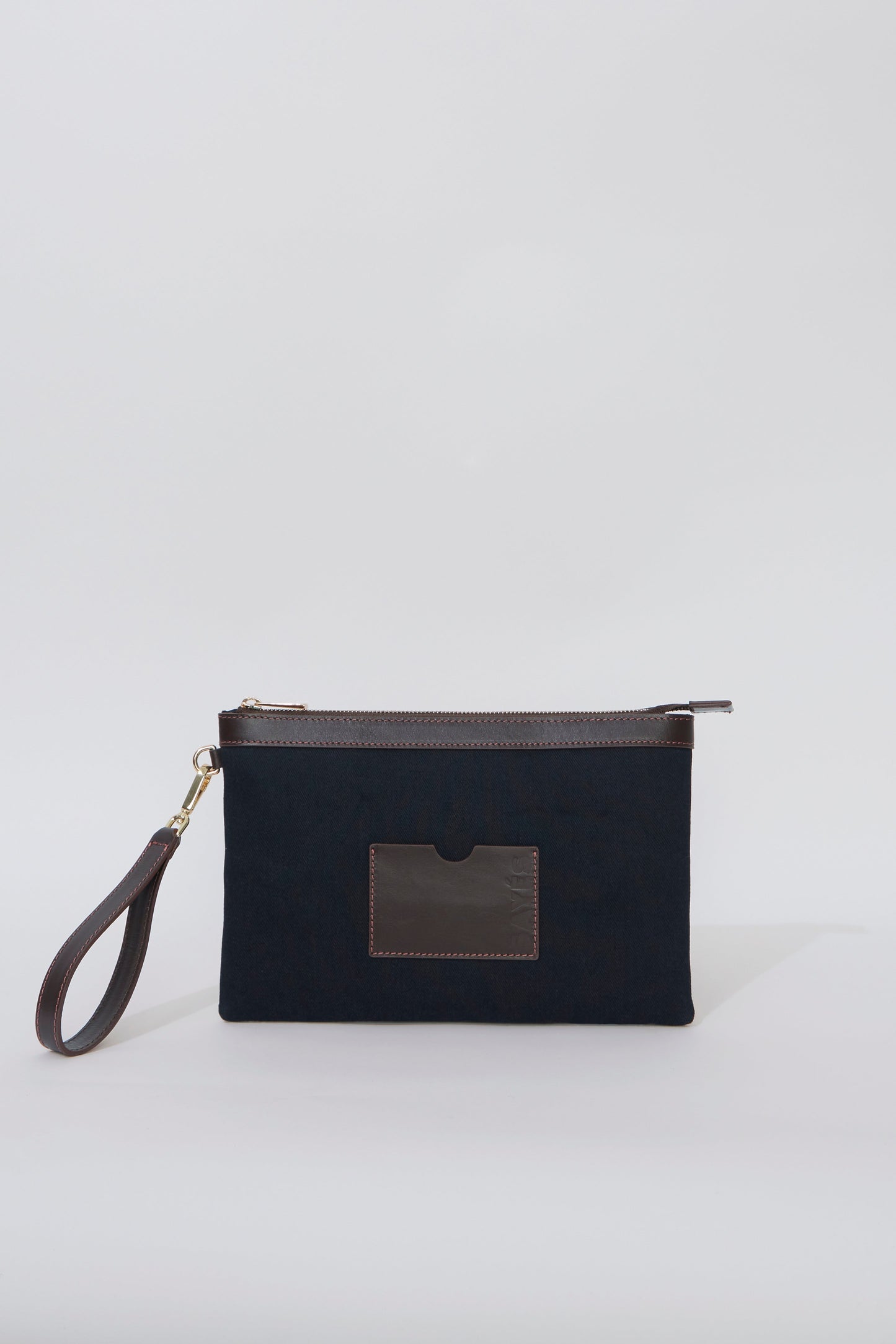 STITCHED CLUTCH IN NAVY/BROWN