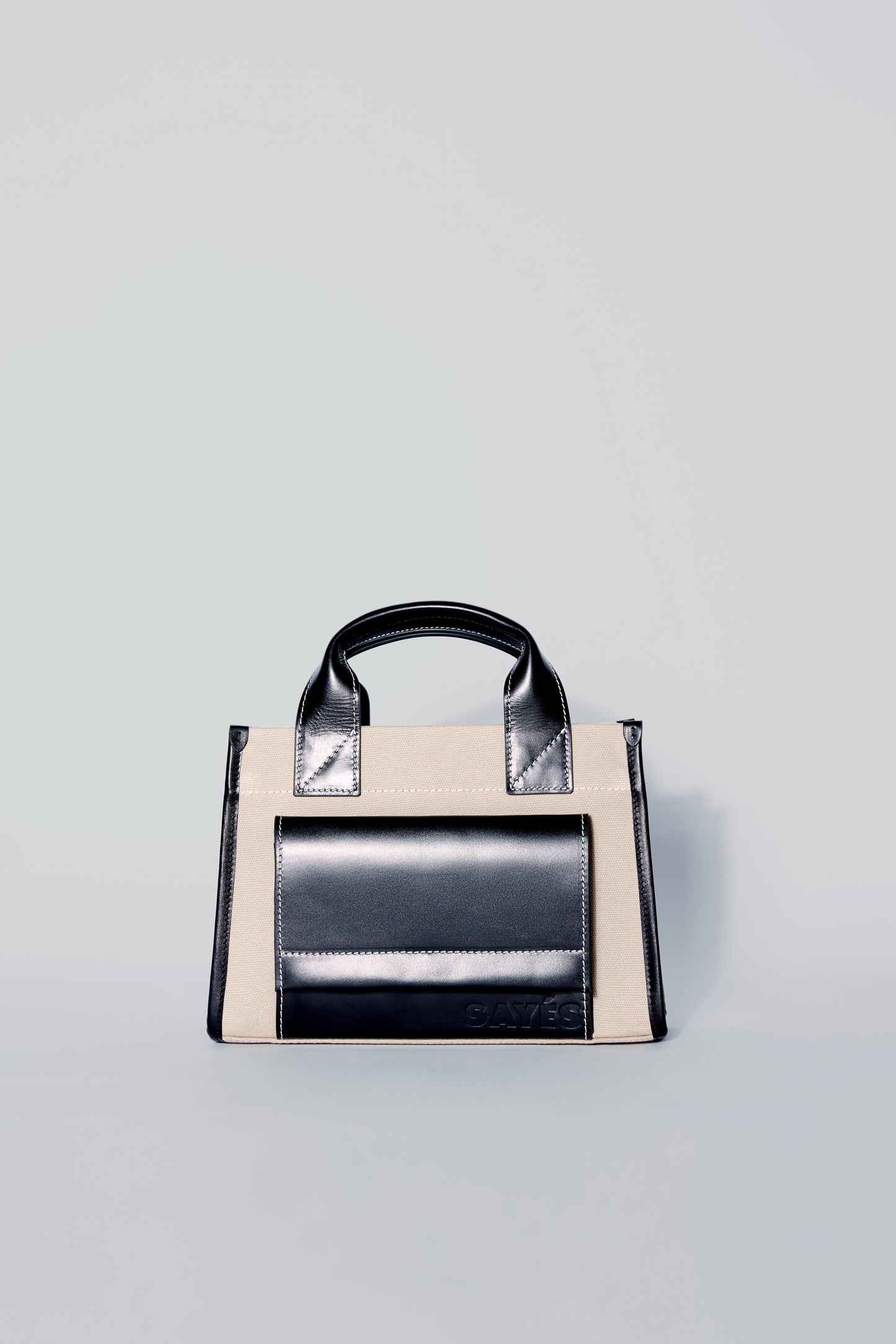 STITCHED POCKET MINI TOTE IN BEIGE/BLACK