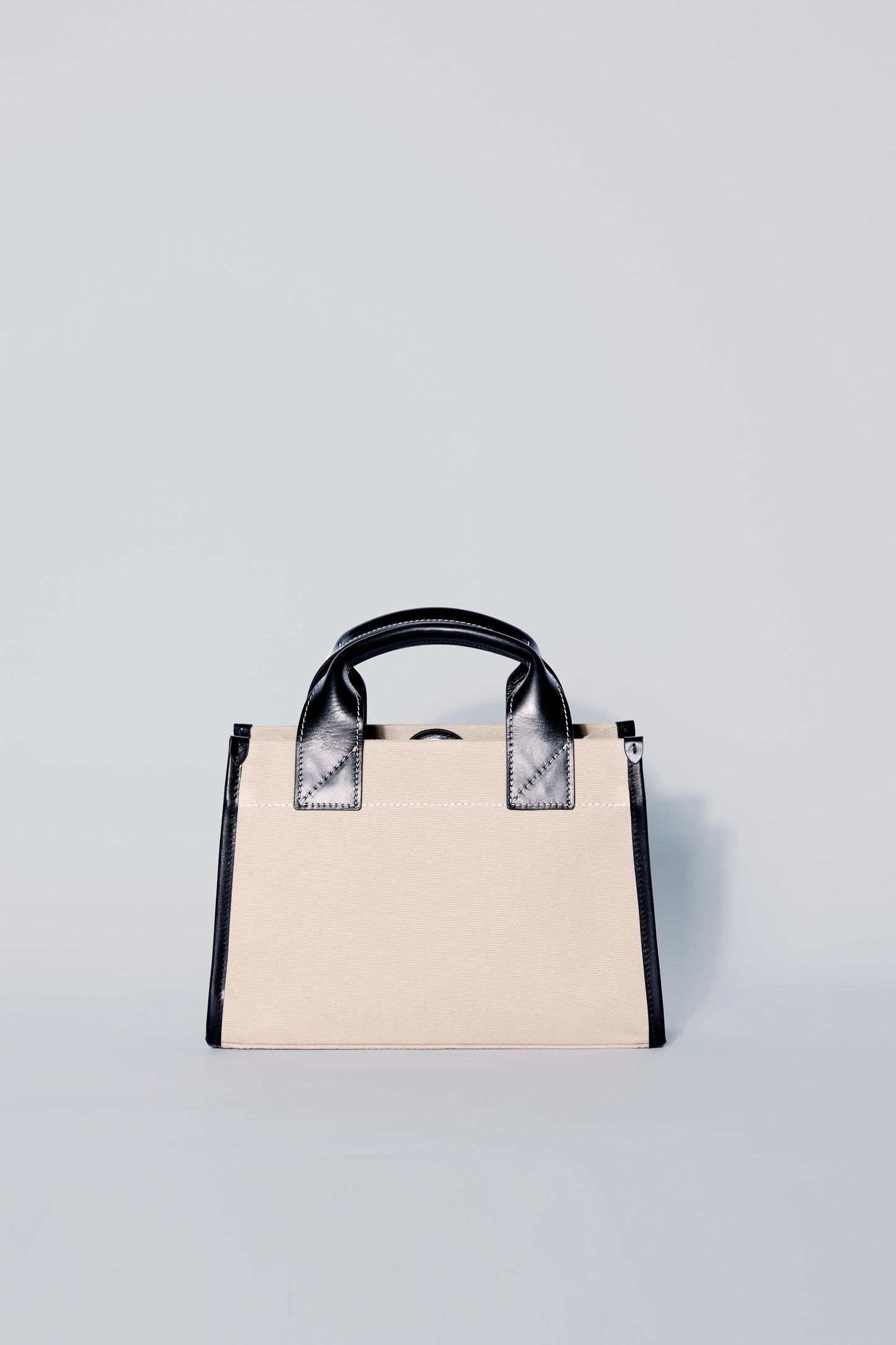 STITCHED POCKET MINI TOTE IN BEIGE/BLACK