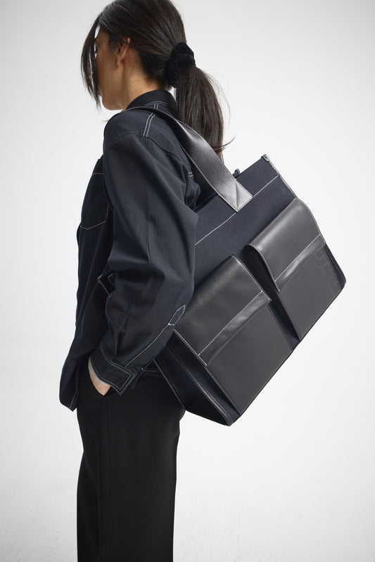 STITCHED POCKET MAXI TOTE NAVY CANVAS AND BLACK LEATHER