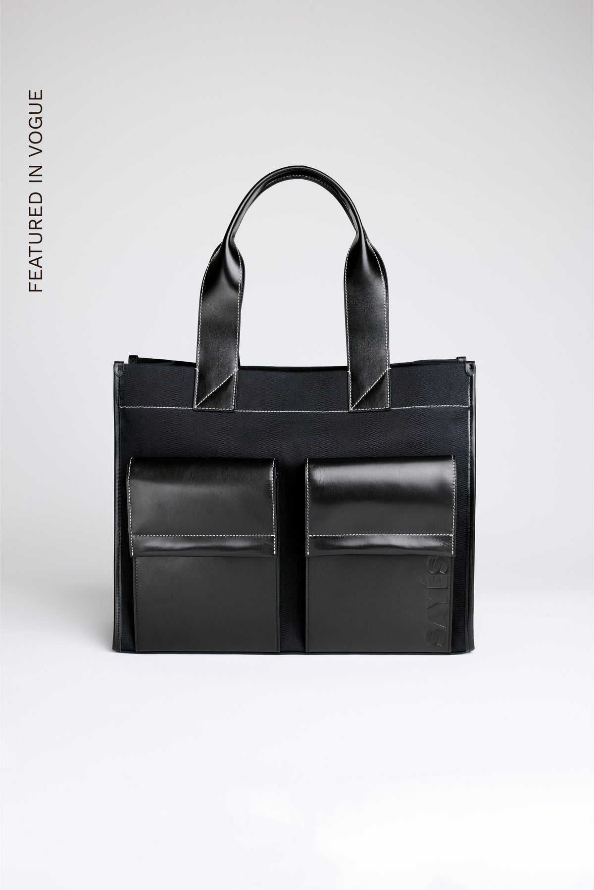 STITCHED POCKET MAXI TOTE NAVY CANVAS AND BLACK LEATHER